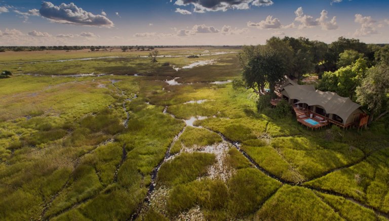 African Safari Sojourn hero banner showcasing Kruger National Park, Botswana and Victoria Falls